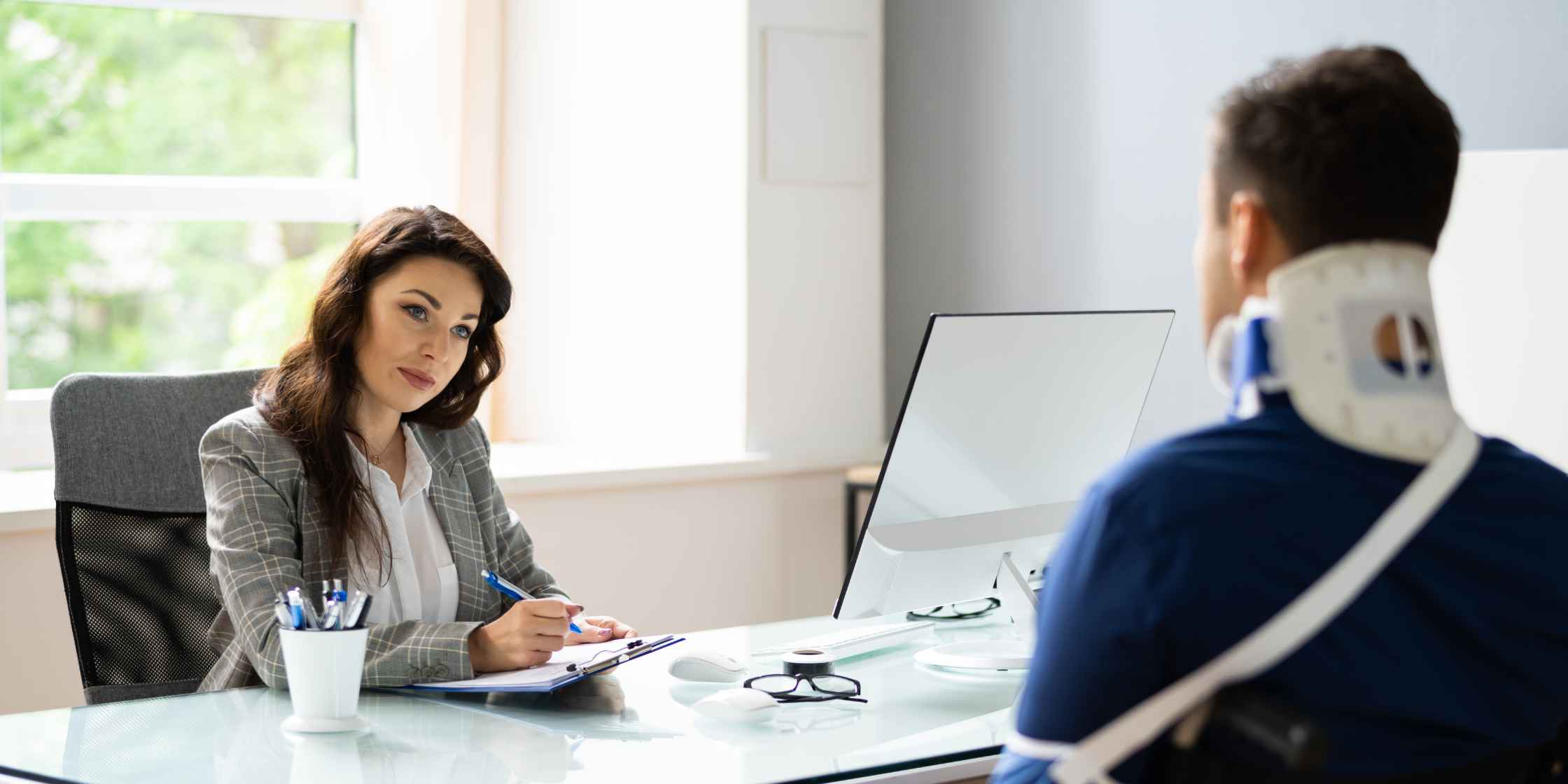 Personal injury consultation with a lawyer for car accident compensation.