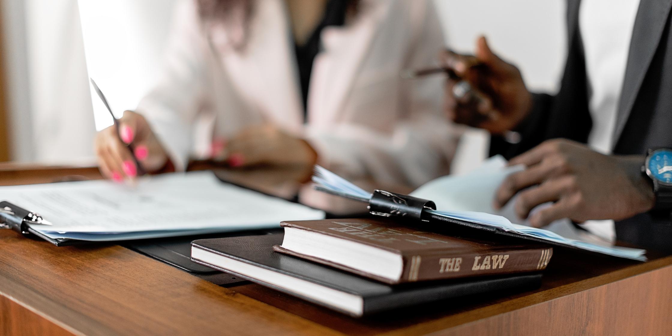 Lawyer advising client on domestic violence charges. Domestic violence cases in Colorado