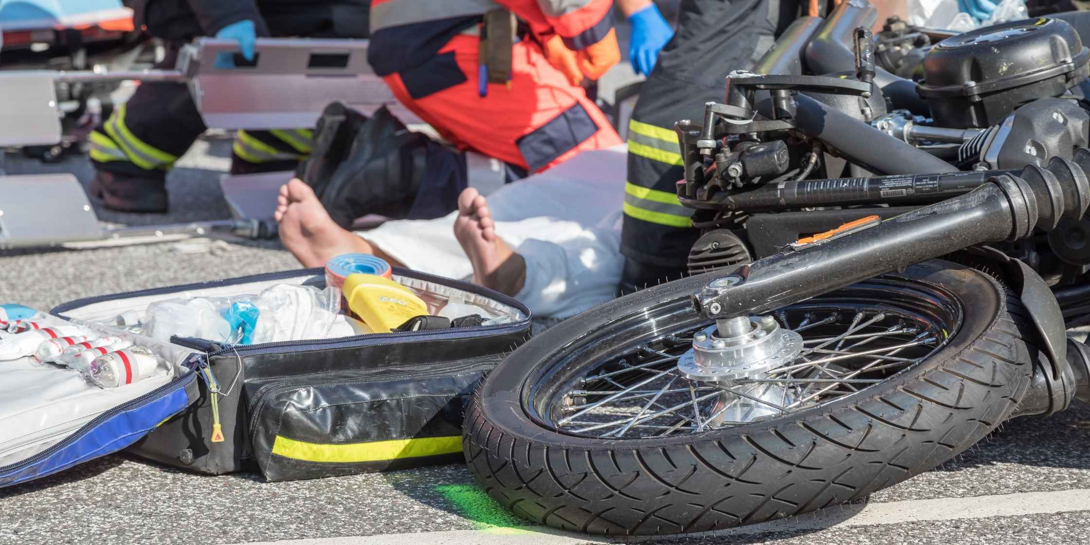 Motorcycle accident scene with digital evidence tools. Motorcycle accident claims 2025